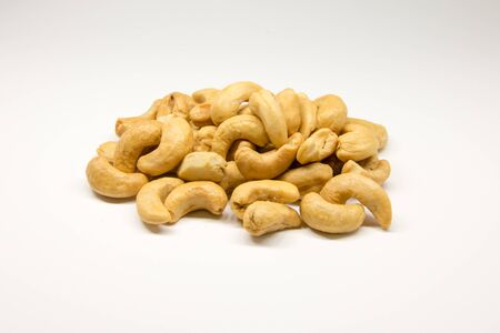 Mango seeds, weed, white backgroundの写真素材