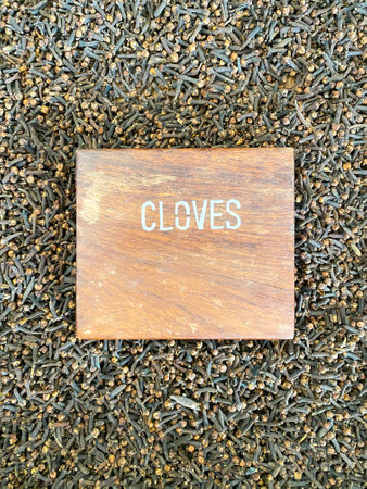 Cloves top view with a nameplate in the middleの写真素材
