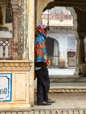Galta Ji, India - January 4, 2024: A female tourist near Galta Mandir palace