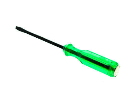 Green handle screwdriver on white background.の写真素材