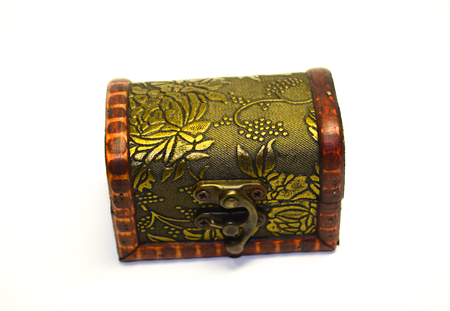 vintage key and old treasure chest on wooden table
