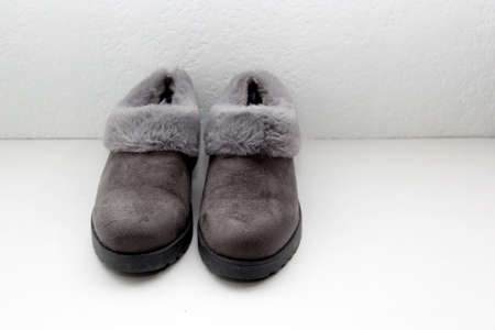 Gray comfortable slipper-type shoes padded inside for greater comfort are non-slip, soft to wear at home to restの写真素材