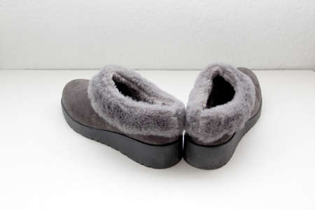 Gray comfortable slipper-type shoes padded inside for greater comfort are non-slip, soft to wear at...