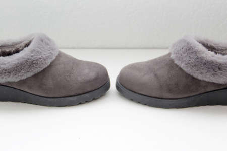 Gray comfortable slipper-type shoes padded inside for greater comfort are non-slip, soft to wear at home to restの写真素材