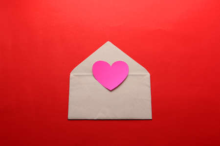 valentines love letters and messages with hearts on red backgroundの写真素材