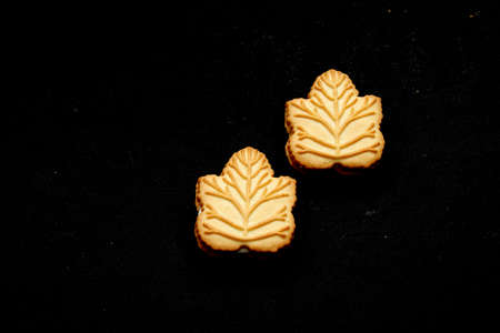 Delicious cookies filled with vanilla cream made with honey or maple syrup from Canadian trees, the traditional sweet of Canadaの写真素材