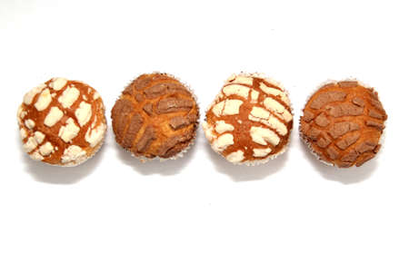 Mexican sweet bread Manteconchas vanilla and chocolate flavor cupcake type made with butter that is...