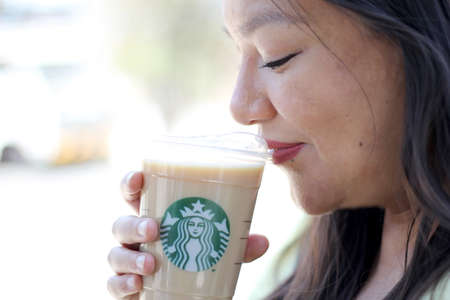 Mexico state, Mexico - May 15 2022: The Starbucks coffee chain that was born in Seattle and belongs to Alsea banned the use of the word frappuccino on the menu with coffee, cocoa, tea, espressoのeditorial素材