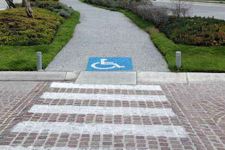 International Symbol of Accessibility to identify the area adapted to people with disabilities a universal symbol that is used as signageの写真素材