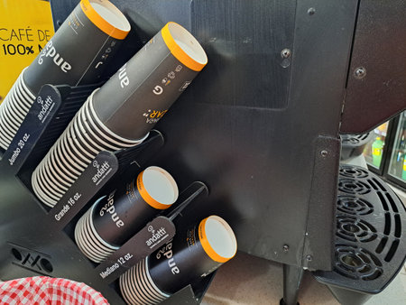 Mexico City, Mexico - Jun 13 2022: Oxxo stores that sell Andatti coffee, change Styrofoam cups for paper and hot dog sausages continueのeditorial素材