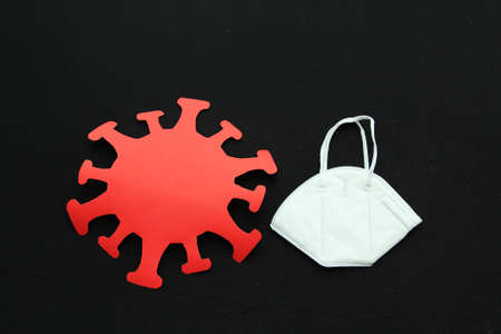 The red epidemiological risk traffic light for the regulation of the use of public space according to the risk of contagion of COVID-19 with face masksの写真素材