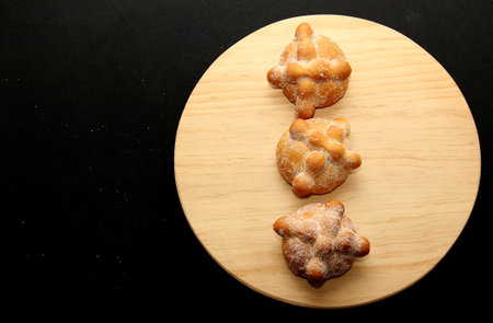 Delicious, fresh, sugary and freshly made Mexican dead bread that is made for the Day of the...