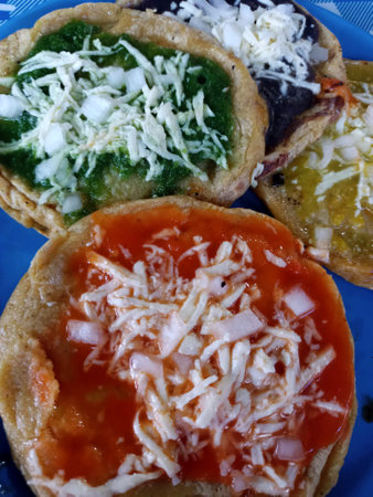 Typical dish from the state of Veracruz in Mexico gorditas picadas which are corn dough tortillas...