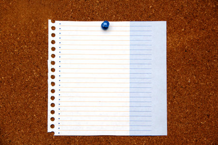 White and color notes for important messages, motivation and reminder on cork board