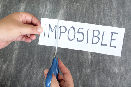 Doing the impossible possible woman hands cutting message