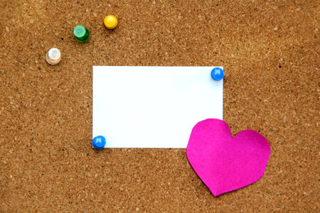 White and color notes for important messages, motivation and reminder on cork boardの写真素材
