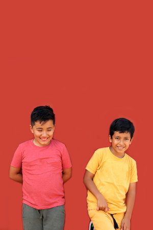 9-year-old Latino children get upset and bully each other as a form of physical, psychological, verbal and social abuse among studentsの写真素材