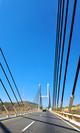 Guerrero, Mexico - Apr 28 2023: Mezcala Solidaridad Bridge cable-stayed over the Balsas River on the Sol Highway leading to Acapulcoのeditorial素材