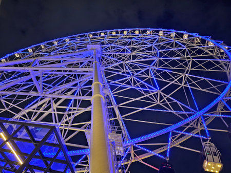Mexico City, Mexico - Mar 20 2024: Night view of the Aztlan 360 Wheel of Fortune, with colorful lighting in the Chapultepec Forest Urban Parkのeditorial素材