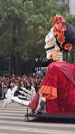 Mexico City, Mexico - Oct 29 2022: Day of the Dead Parade to celebrate the richness of Mexican...