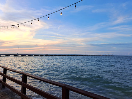 Progreso is a Mexican port city on the Yucatan Peninsula with its iconic arched pier and famous boardwalkの写真素材