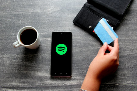 Mexico City, Mexico - Nov 9 2022: Spotify a digital music, podcasts and video service that gives you...