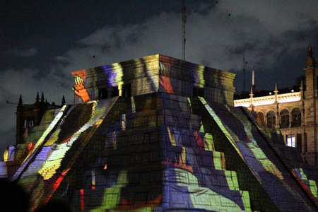 Mexico City, Mexico - Jul 12 2024: Audiovisual video mapping show in a replica of the Kukulcan Yucatan pyramid in the Zocalo of CDMXのeditorial素材
