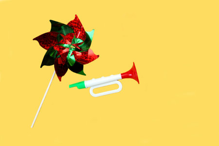 Tricolor toy trumpet with the colors of the Mexican flag to celebrate Independence Day of Mexico and...