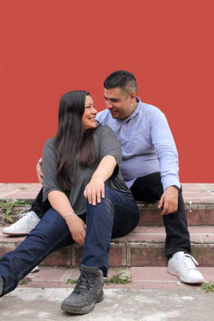 Latin man and woman couple show their love and celebrate Valentine's Dayの写真素材