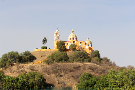 The Great Pyramid Tlachihualtepetl is the largest in the world and at the top is the Church of Our Lady of Remedies in Cholula, Puebla, Mexicoの写真素材