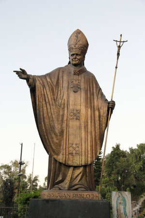 Mexico City, Mexico - Nov 26 2024: Bronze sculpture of Pope John Paul the Second in the Basilica of Guadalupe in Mexico City as a remembrance of his visitのeditorial素材