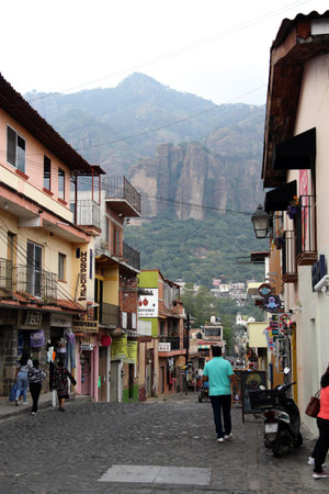 Tepoztlan, Morelos, Mexico - Nov 7 2024: Cobbled streets of the magical town Tepoztlan in Morelos, Mexico, a place of rest, mystical and warm climateのeditorial素材
