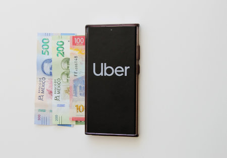 Mexico City, Mexico - Feb 22 2025: Uber is an application that is downloaded to your cell phone that...