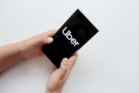 Mexico City, Mexico - Feb 22 2025: Uber is an application that is downloaded to your cell phone that...