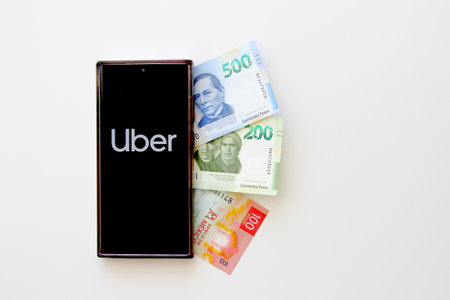Mexico City, Mexico - Feb 22 2025: Uber is an application that is downloaded to your cell phone that...