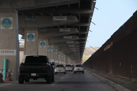 Tijuana, Baja California, Mexico - Mar 14, 2025: The border wall between Tijuana and San Diego is a...