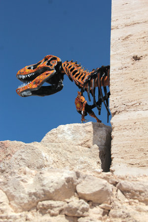 Cuatro Cienegas, Coahuila, Mexico - Jul 28 2025: Dinosaur skeletons in the Marble Mines of Cuatro Cienegas, Coahuila, Mexico among mountainous desert landscapeのeditorial素材
