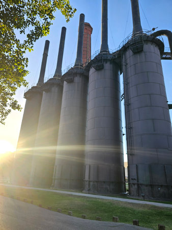 Monterrey, Nuevo Leon, Mexico - Jul 29, 2025: Machinery parts at Monterrey's Fundidora Park for the smelting of steel and iron in a green and cultural spaceのeditorial素材