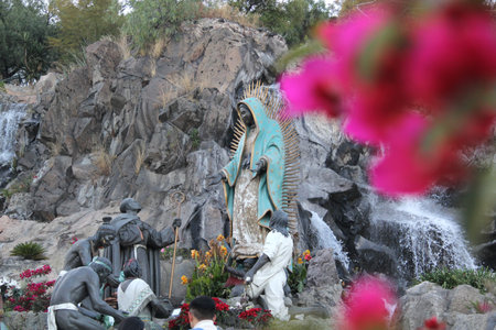 Mexico City, Mexico - Nov 25, 2024: Fountain of the sculpture group called La Ofrenda with the Virgin and indigenous people in the Basilica of Guadalupe in CDMXのeditorial素材