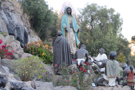 Mexico City, Mexico - Nov 25, 2024: Fountain of the sculpture group called La Ofrenda with the Virgin and indigenous people in the Basilica of Guadalupe in CDMXのeditorial素材