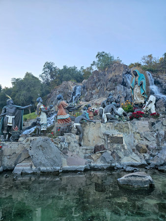 Mexico City, Mexico - Nov 25, 2024: Fountain of the sculpture group called La Ofrenda with the Virgin and indigenous people in the Basilica of Guadalupe in CDMXのeditorial素材