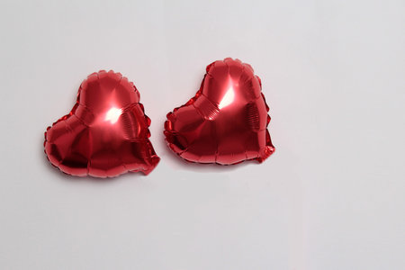 Red heart-shaped balloon to represent love and the celebration of Valentine's Day