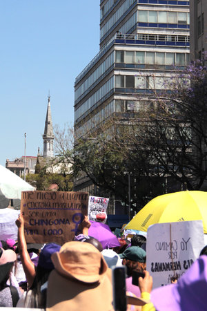 Mexico City, Mexico - Mar 8, 2025: 8M is the march held every March 8th for International Women's Day to demand equality, denounce violence, femicide, machismo and discriminationのeditorial素材