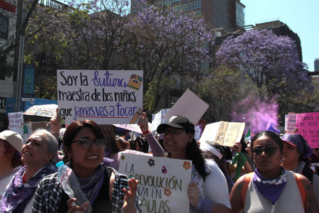 Mexico City, Mexico - Mar 8, 2025: 8M is the march held every March 8th for International Women's Day to demand equality, denounce violence, femicide, machismo and discriminationのeditorial素材