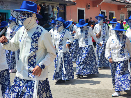 Xicotepec, Puebla, Mexico - Mar 2, 2025: Traditional Huehues dancers from the carnivals of Puebla in...