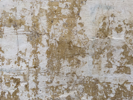 Rough white surface with dakr yellow splashesの写真素材