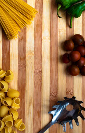Background with ingredients of the typical Italian diet, on a wooden backgroundの写真素材