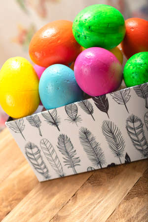Easter concept. Easter eggs of different colors in a box.の写真素材