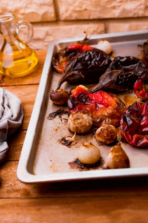 Food from the garden cooked in the oven with olive oil.の写真素材