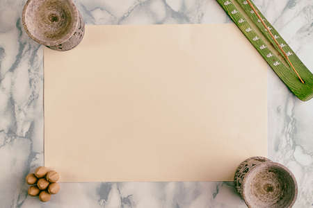 Invitation created with relaxation elements such as incense of different types.